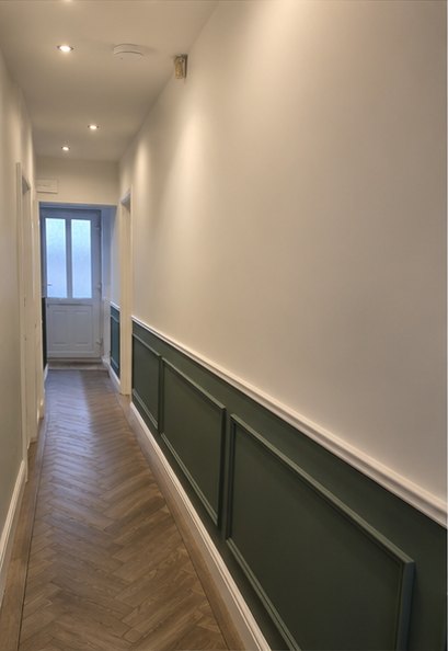 Hallway with green wainscot panelling and herringbone floor, Leicester