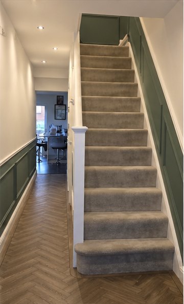 Staircase with green panelling and herringbone hallway floor, Leicester